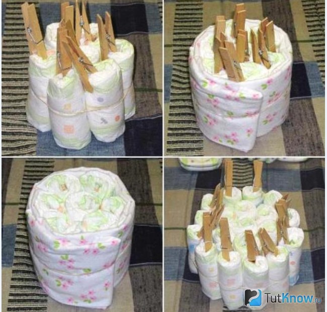 Зафиксированные прищепками составляющие яруса торта