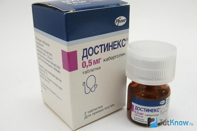 Упаковка и баночка каберголина