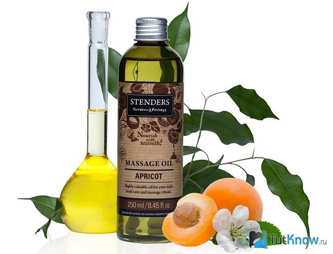 Фирменный флакон абрикосового масла для ухода за волосами