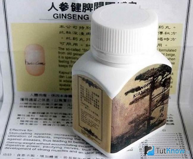 Баночка с препаратом Ginseng Kianpi Pil крупным планом