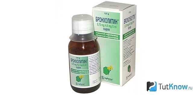 Баночка Бронхолитина и её упаковка на белом фоне