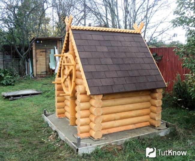 Отделка домика для колодца