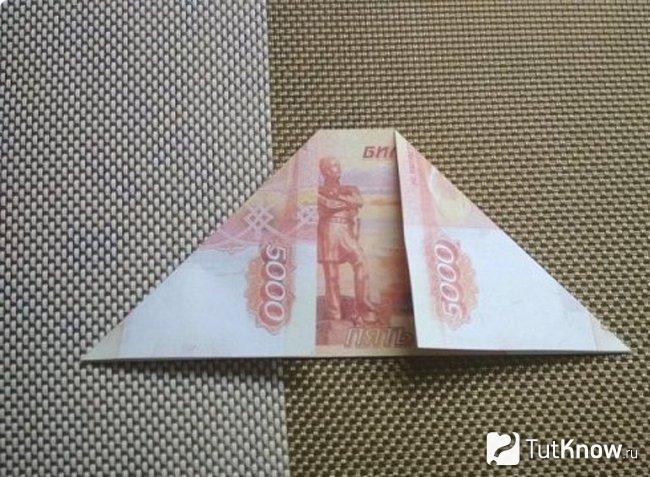 Загибание углов денежной купюры