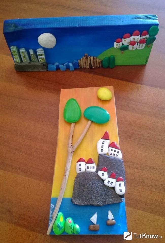 Поделки из цветных камней на деревянной поверхности