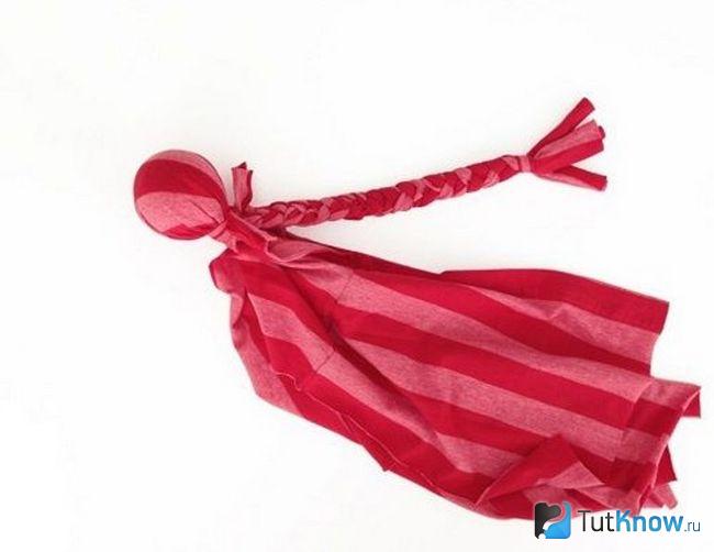 Сплетенная косичка на игрушке для собаки