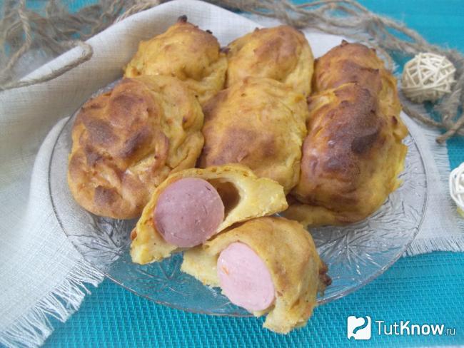 Готовые сосиски в картофельном тесте в духовке