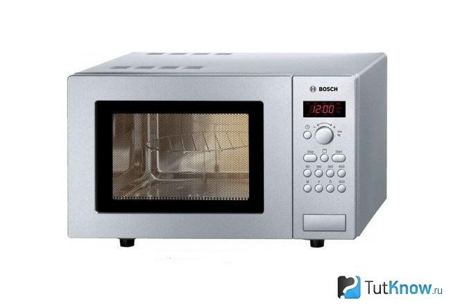 Микроволновка Bosch HMT75G451 на белом фоне